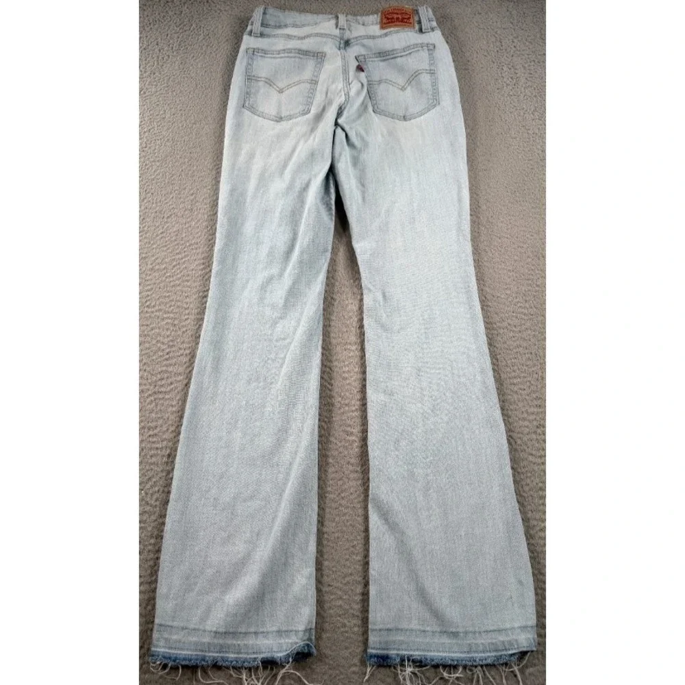 Levi's 725 High Rise Bootcut Jeans Womens 30 (26x32) Light Wash Raw Hem